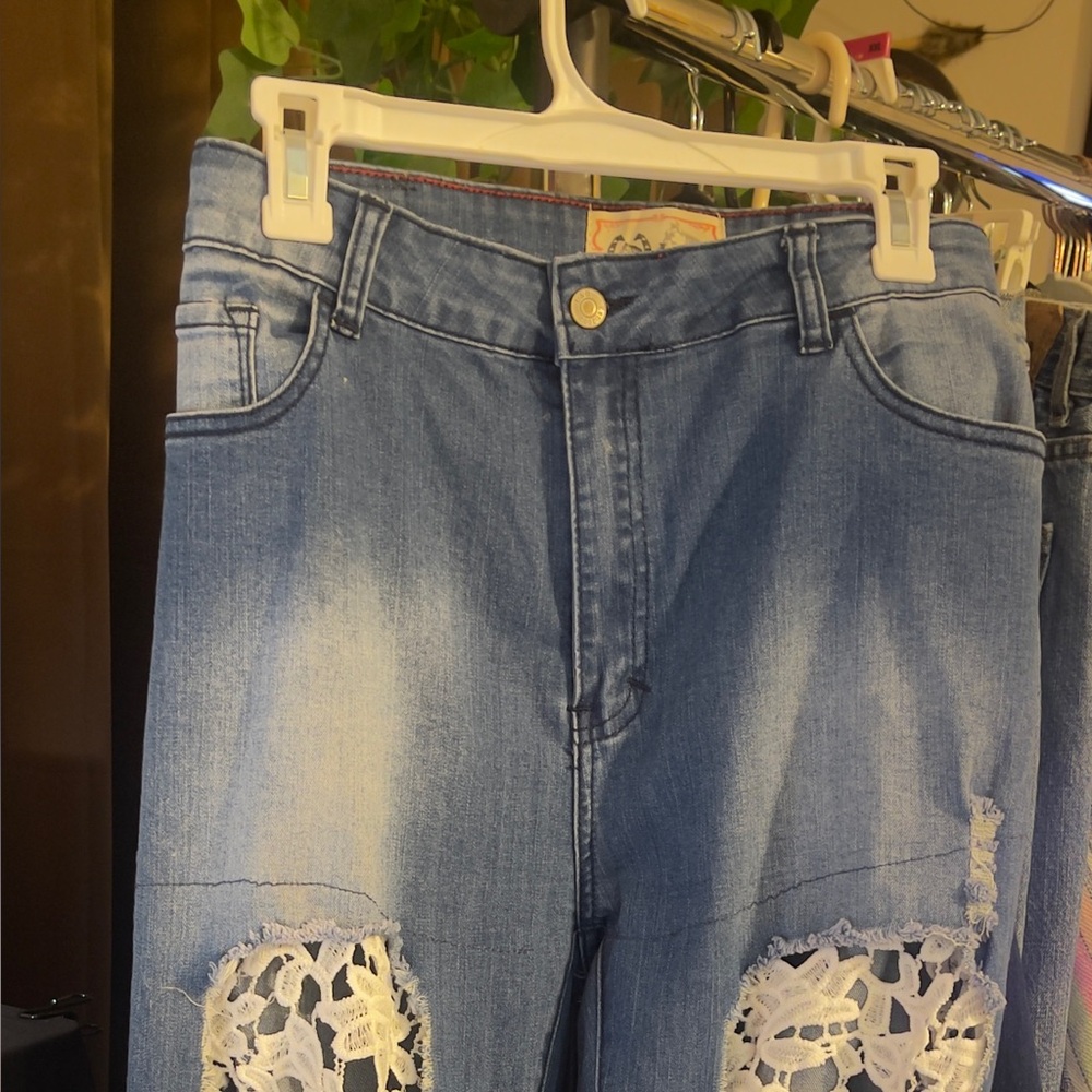 Stylish Blue Distressed Jeans with Lace Accents by L& B